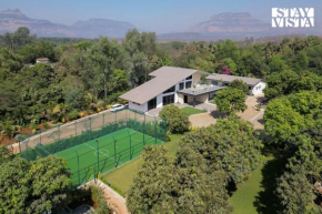 The Den by StayVista - Private pool with Deck & Jacuzzi, Manicured gardens with Gazebos, Projector, Turf & Terrace
